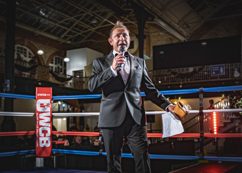 Nick Mummery commanding the UWCB ring with microphone in hand